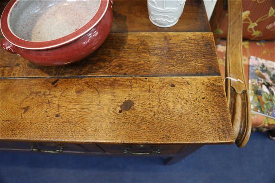 A George III oak dresser base, W.7ft 8in. D.1ft 7in. H.3ft 2in.